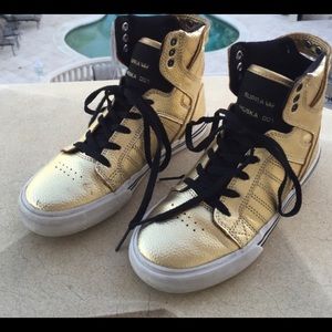 Gold Supra only worn 1 time and is good to wear.